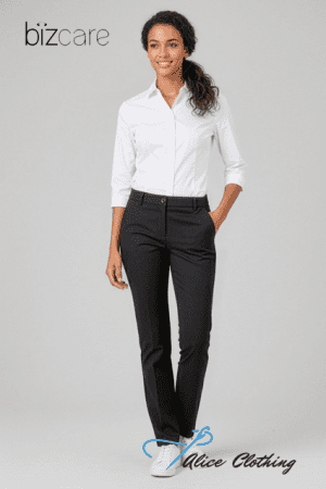 Female model wearing a white button-down shirt and black dress pants, standing with hands in pockets. Bizcare logo top left; Alice Clothing watermark bottom right.