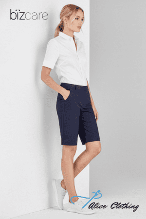 Model wearing a white short-sleeve blouse and navy tailored shorts, standing against a light wall with hands in pockets; bizcare and Alice Clothing logos shown in corners.