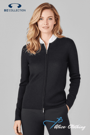 Model wearing a black zip-front cardigan with a white collar, standing against a light gray background.