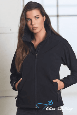 Woman in a black zip-up jacket stands indoors with hands in pockets, gazing at the camera; Alice Clothing logo appears bottom right.