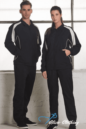 Two models wearing matching black athletic jackets and pants with white piping, posing in a bright studio setting.