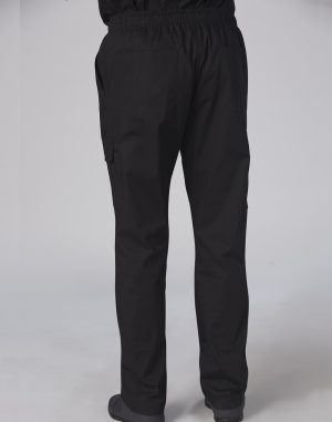 Back view of a person in black cargo pants with an elastic waistband and rear pockets, standing on a gray studio backdrop.