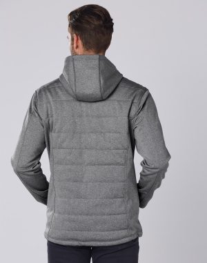 Man wearing a gray quilted hooded jacket, viewed from the back against a plain background