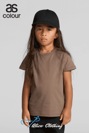 Young girl model wearing a brown T‑shirt and black cap, with as Colour and Nice Clothing logos visible.
