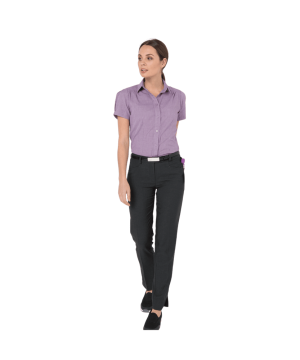 Woman in a lavender short-sleeve blouse and black dress pants walking, looking to the left.