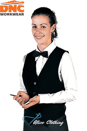 Smiling woman modeling DNC Workwear: white shirt, black vest, and bow tie; holding a pen.