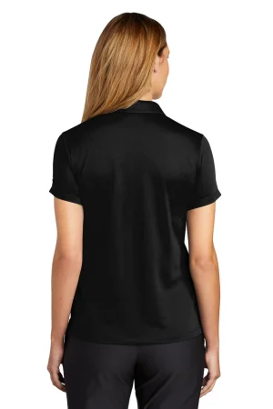 Woman seen from behind wearing a black short-sleeve polo shirt against a white background.