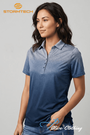 Model wearing a blue gradient polo shirt (light blue to navy) posing against a gray backdrop; Stormtech logo top-left and Alice Clothing watermark bottom-right.