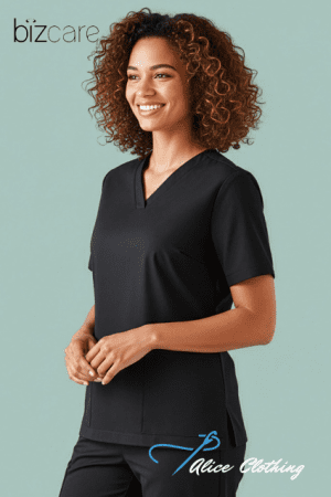 Smiling woman with curly hair wearing black scrubs against a teal background; bizcare logo top left.