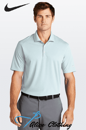 Man wearing a light blue polo shirt and gray trousers, standing against a light backdrop; Nike logo in top-left corner and 'Palace Clothing' watermark at bottom.
