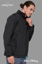 Side-profile view of a man wearing a black zip-front jacket with a high collar, showcasing outerwear.
