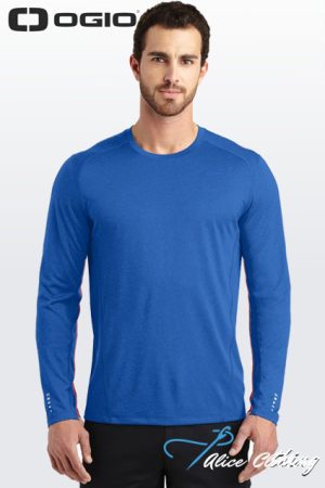 Male model wearing a royal blue long-sleeve athletic shirt, front view; OGIO logo visible at the top-left corner of the image.