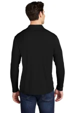 Back view of a man wearing a black long-sleeve shirt and blue jeans, facing away from the camera.