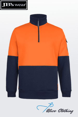 Orange and navy color-block pullover with a half-zip collar on a white gradient background; JB's Wear logo in the top-left.