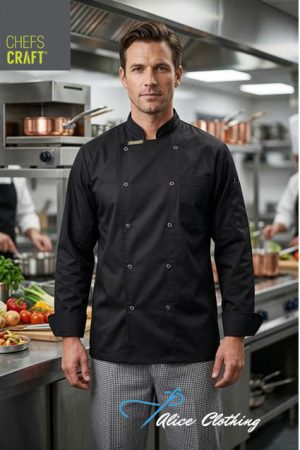 Professional chef in a black double-breasted jacket stands in a busy commercial kitchen; Chefs Craft and Alive Clothing logos visible in corners.