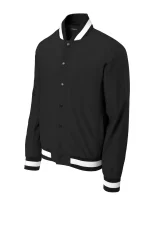 Black varsity jacket with a white striped collar, cuffs, and hem, buttoned front and side pockets