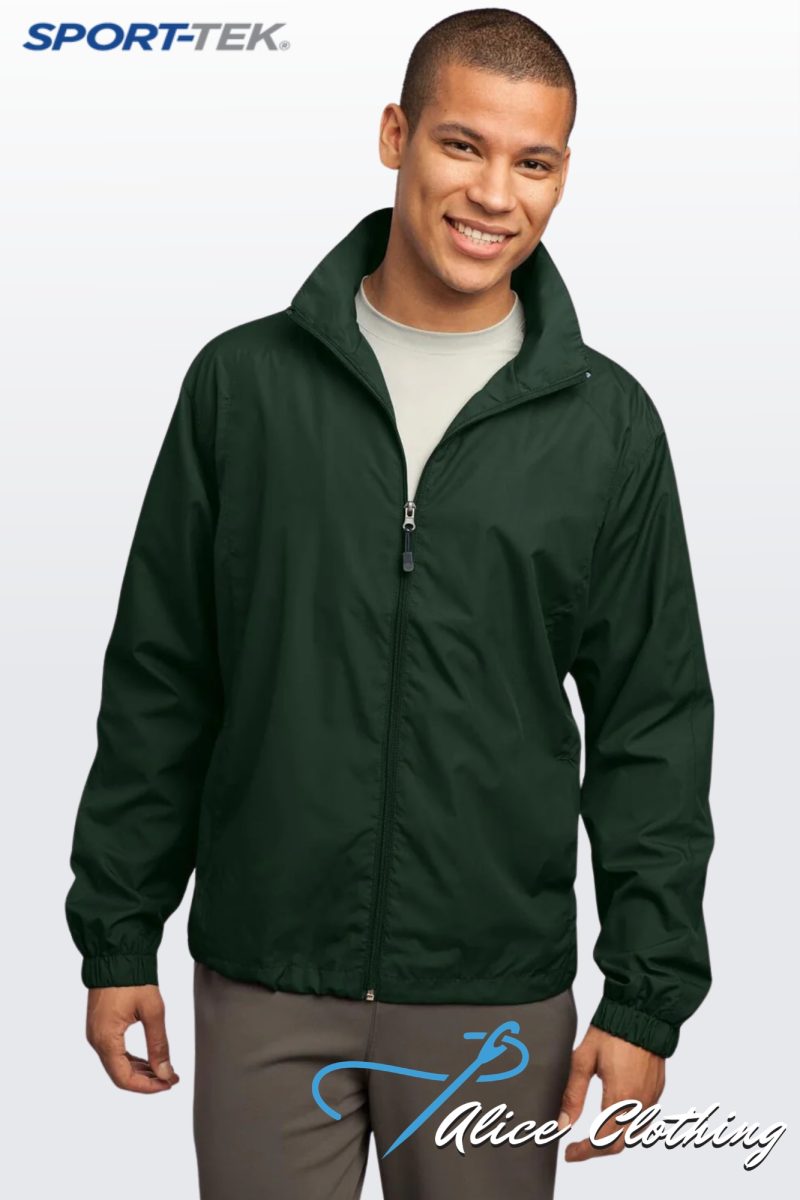 Man in a dark green zip-up windbreaker against a light gradient background; SPORT-TEK logo top-left and 'Alice Clothing' watermark bottom-right