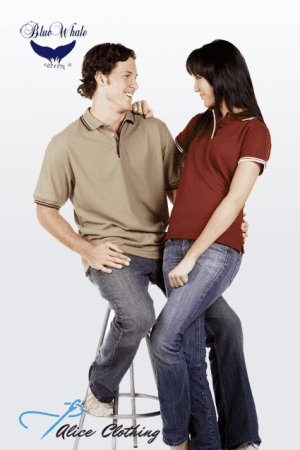 P51-P56 Pique Polo with Striped Collar and Cuff - Alice Clothing Two casually dressed adults sit on a stool, smiling at each other; Blue Whale logo top left and Alice Clothing bottom left.