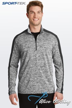 Male model wearing a heather gray quarter-zip pullover with black shoulder panels; SPORT-TEK logo in the top-left corner.